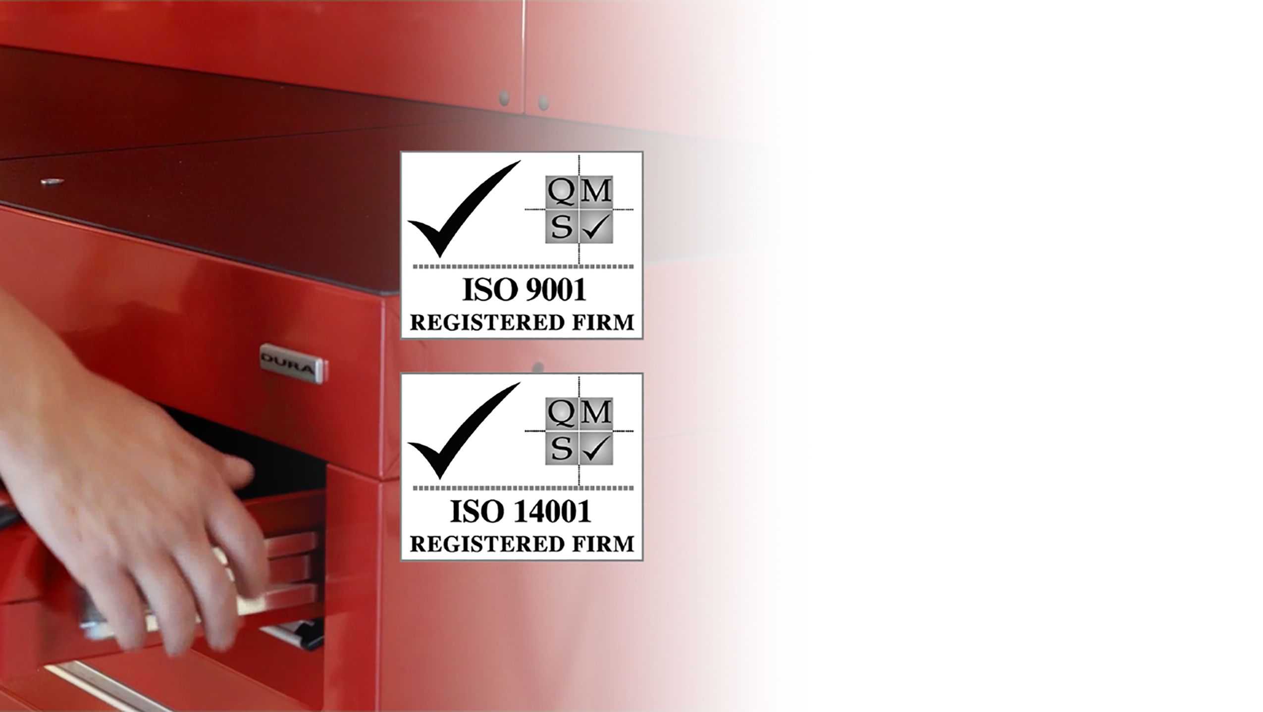 Drawer opening on red tool cabinets with ISO 9001/14001 logos